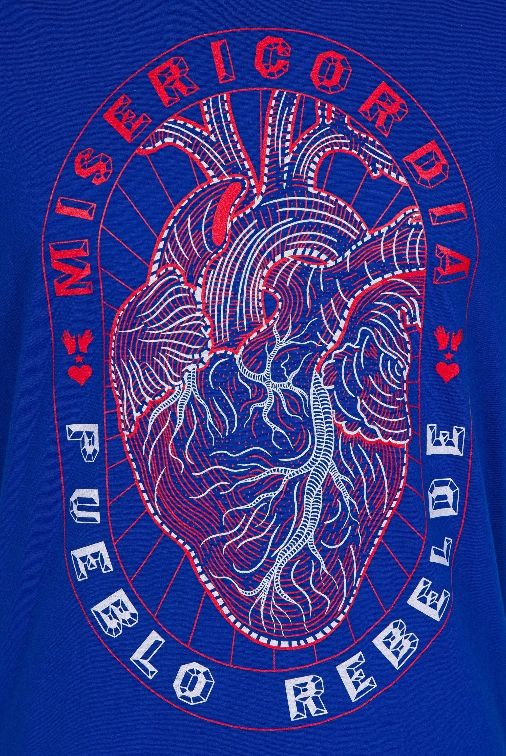 Serigraphie Corazon, qui represente un coeur humain dans un ovale, autour de lui est écrit "Misericordia Pueblo Rebelde"