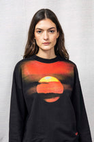 Sweatshirt Angela Puesta De Sol Noir sweatshirt femme, pièce basique et vêtement cocooning du quotidien