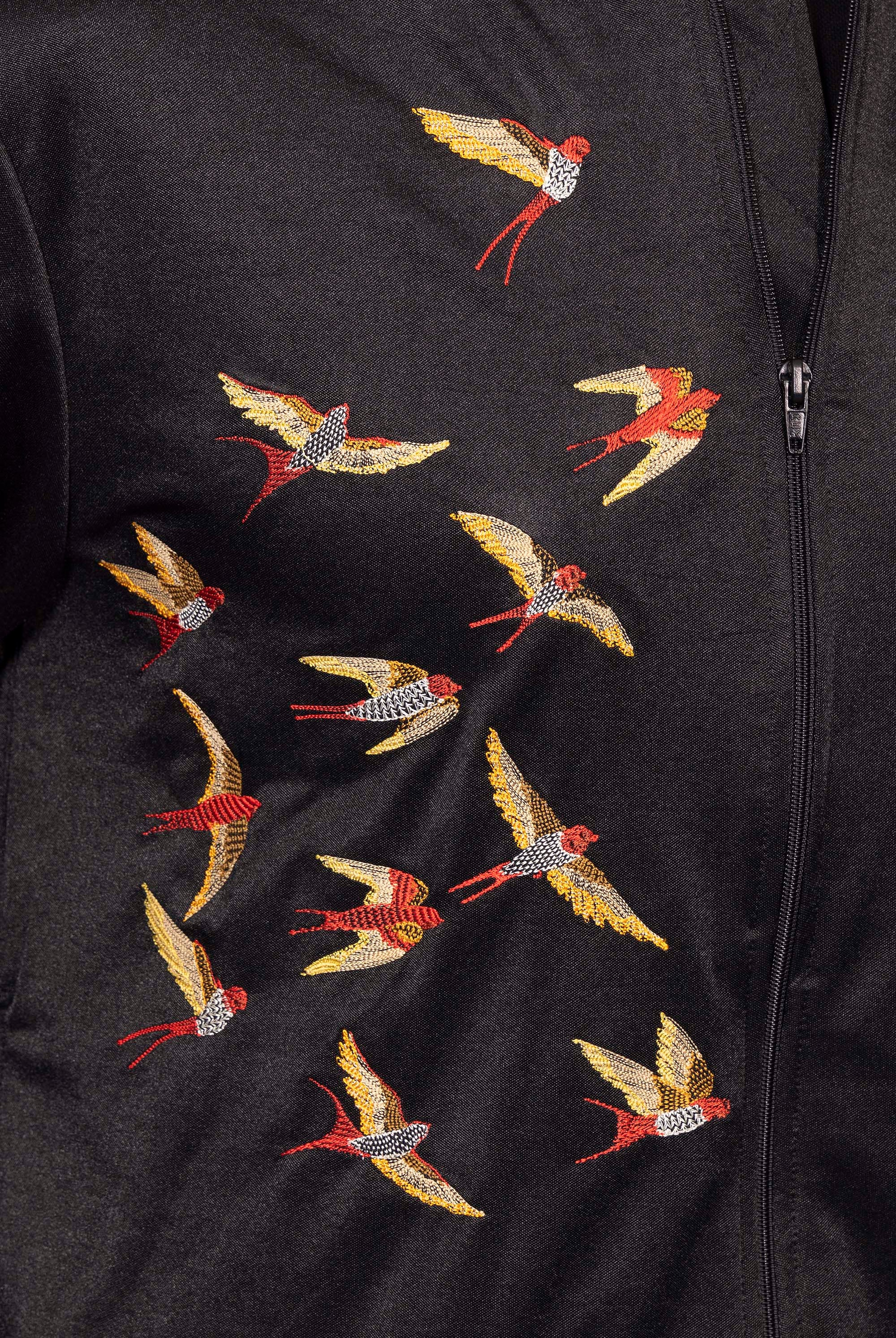 Blouson Paraguas Aves Noir veste de sport pour dynamiser une tenue décontractée