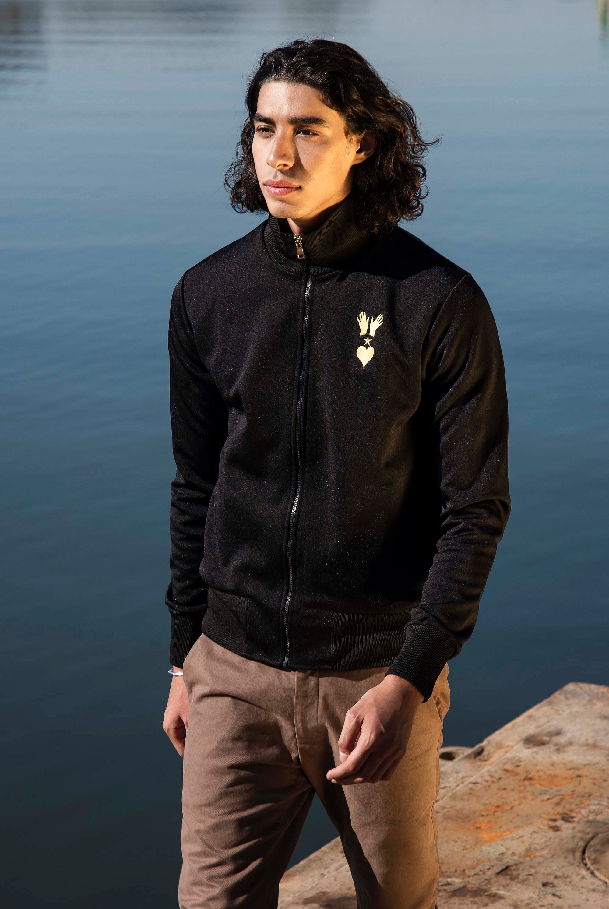 Veste de Sport Orgullo Manos Noir veste de sport pour dynamiser une tenue décontractée