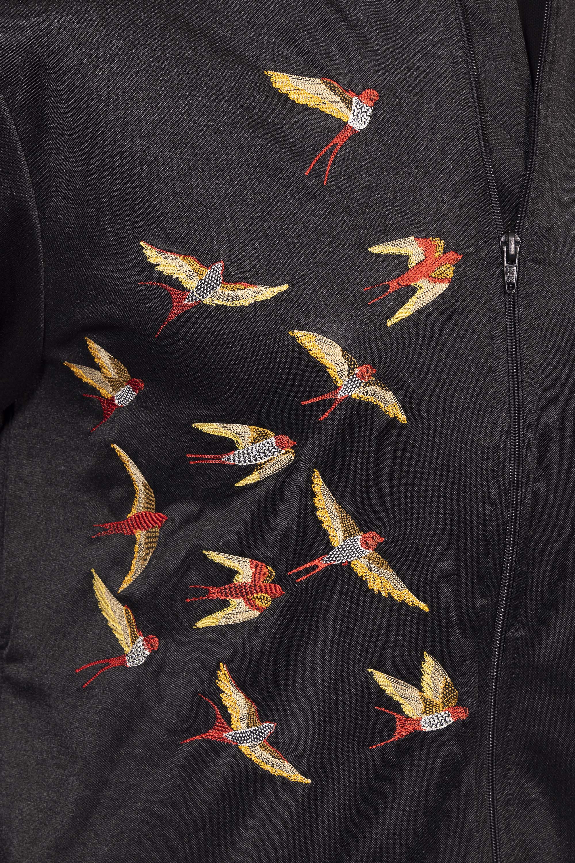 Blouson Paraguas Aves Noir veste de sport pour dynamiser une tenue décontractée