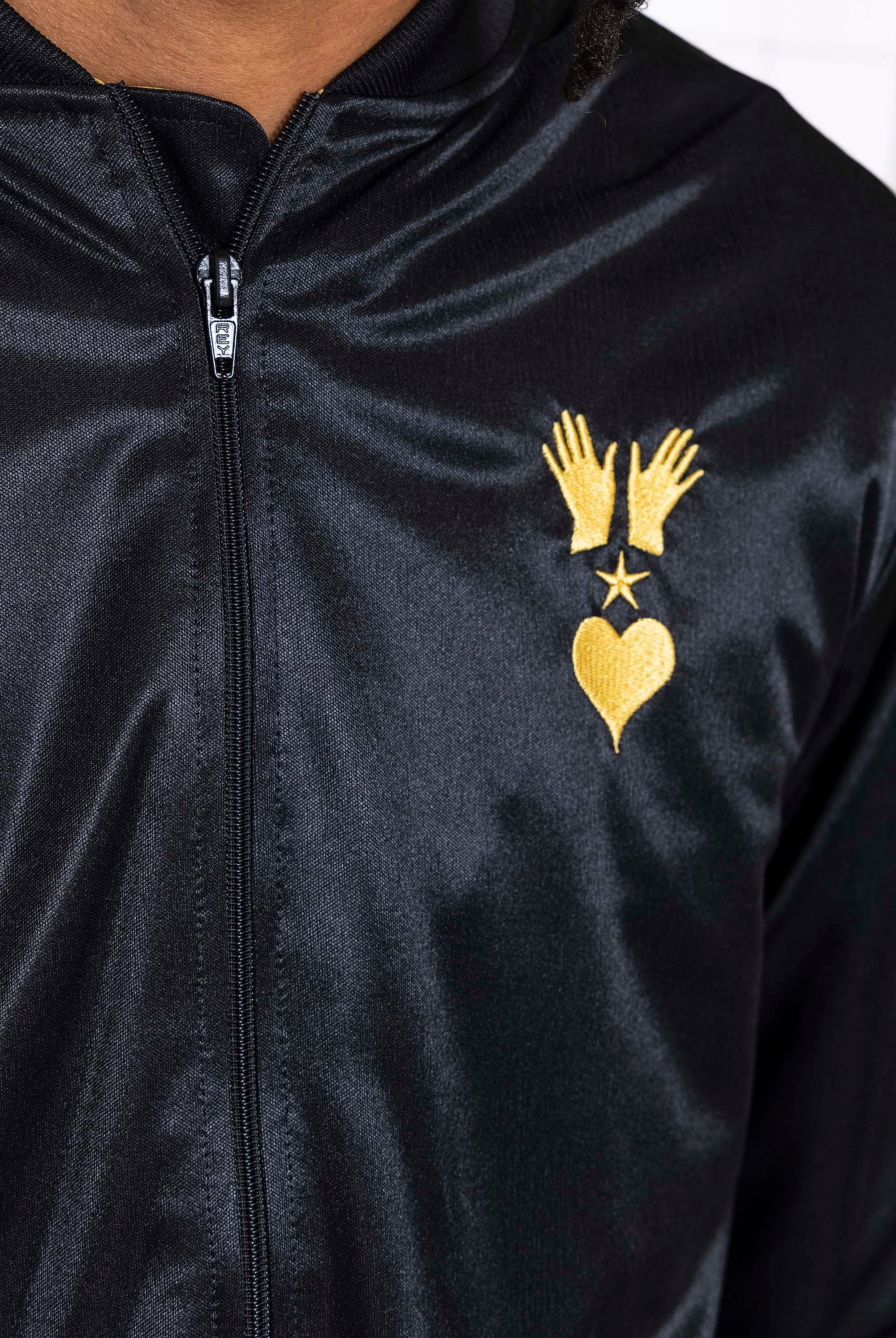 Blouson Paraguas Bola de Fuego Noir veste de sport pour dynamiser une tenue décontractée