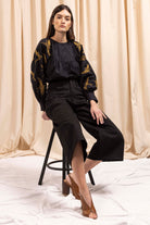 Pantalon Margarita Noir minimalisme et détails tendance, coupes classiques et une palette de couleurs neutres
