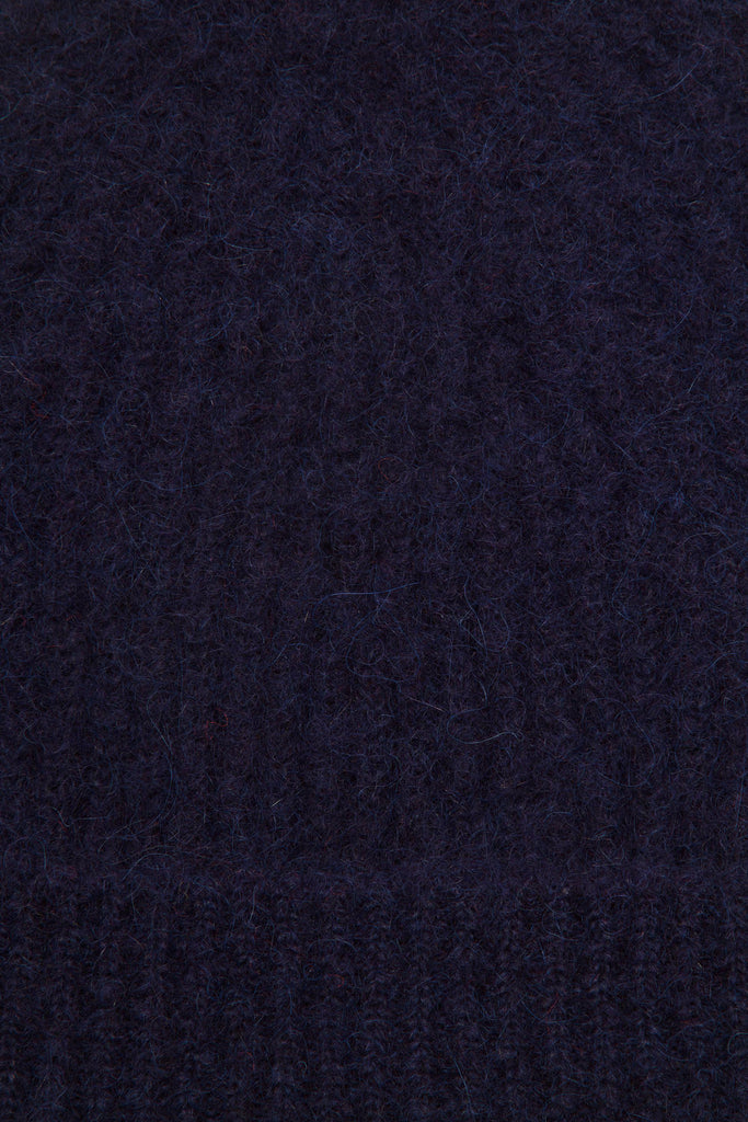 Bonnet Lija Pompon Bleu Marine hiver au chaud protection du froid